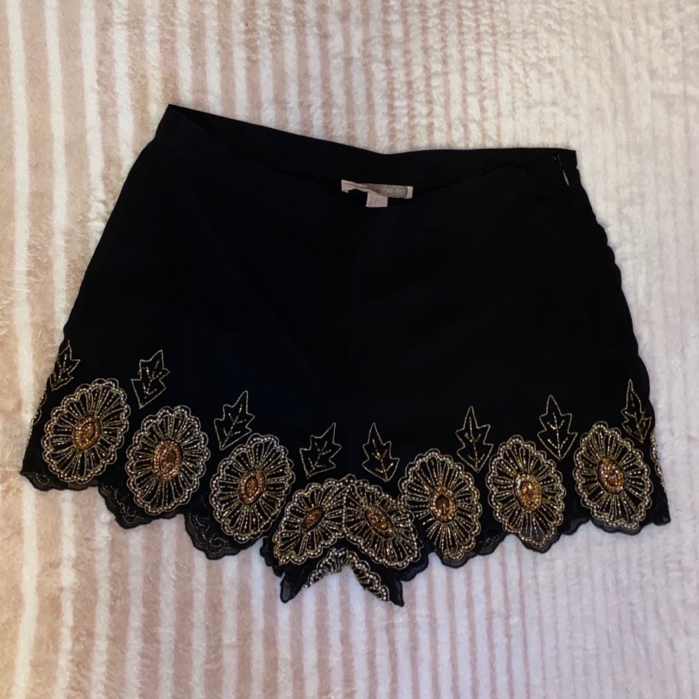 Black and gold embellished shorts